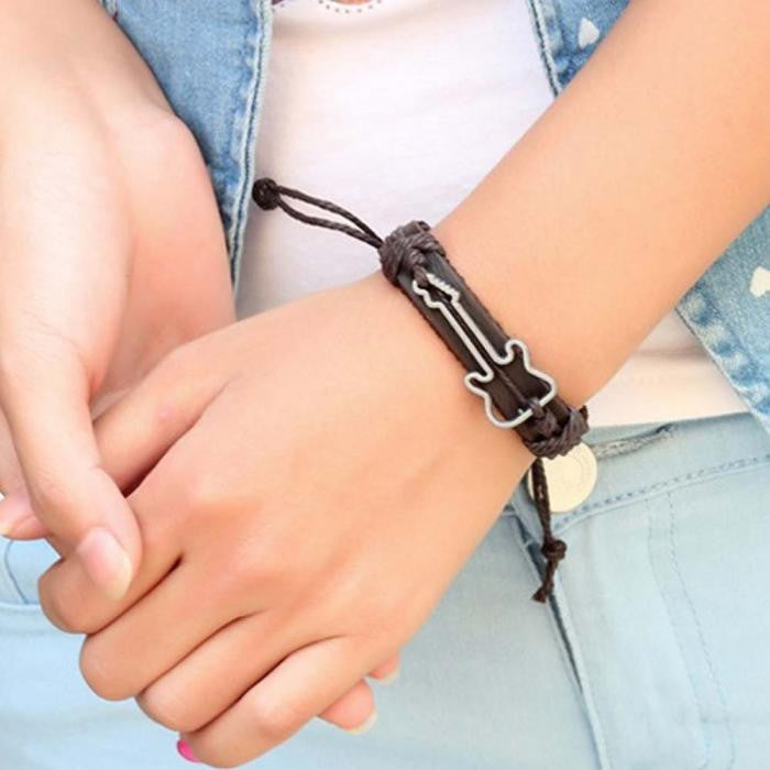 Black bracelet made of synthetic leather and strings, cut-out guitar  contour | Jewelry Eshop